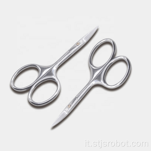 Le sopracciglia degli strumenti di cura personale usano le forbici di bellezza delle donne
